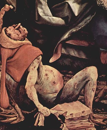 A painting of a man lying on the ground with his head resting on his hands. He appears to be unconscious or dead with his body covered in blood and blood stains. His head is tilted back and his eyes are closed as if he is in a state of deep sleep. He is wearing a red robe and has a long flowing robe draped over his shoulders. The background is dark and there are various objects scattered around him including a pile of books and a vase with flowers. The overall mood of the image is somber and melancholic.