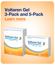 Two boxes of Voltaren Gel a 3-pack and 5-pack of gel. The boxes are white with orange and blue accents. The brand name "Voltaren Gel" is written in bold blue letters at the top of the boxes. Below the brand name there is a description of the product in smaller blue letters that reads "Learn more". The boxes appear to be new and unused. The background of the image is a light orange color.