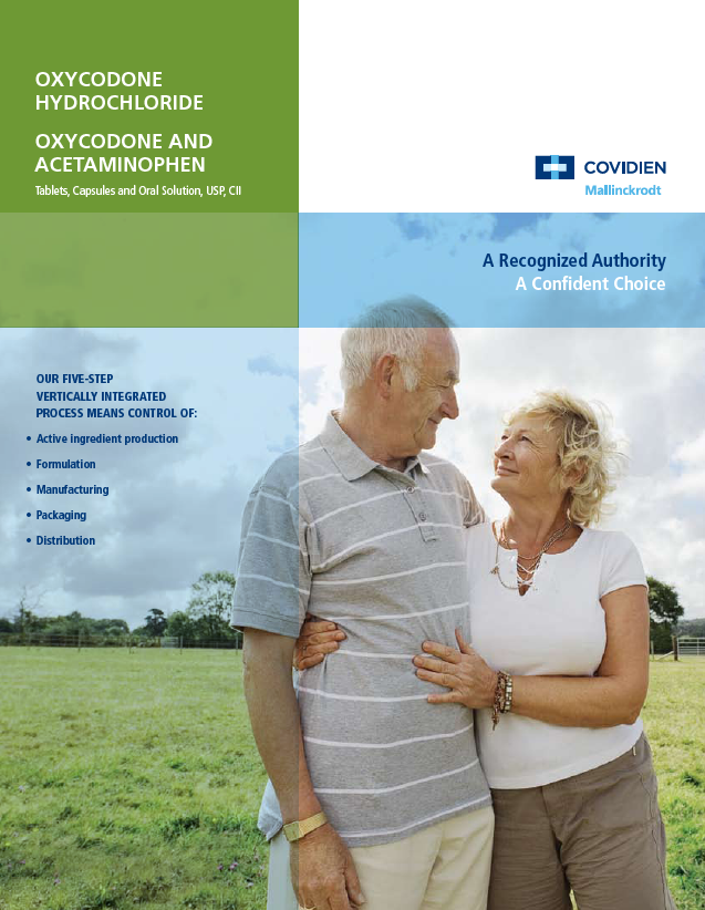 An elderly couple standing in a field with their arms around each other. They are both smiling and looking at each other lovingly. The man is wearing a gray polo shirt and khaki pants while the woman has blonde hair. The background shows a blue sky with white clouds and green fields. On the left side of the image there is text that reads "Oxycodone Hydrochloride Oxycodone and Acetaminophen Tablets Capsules and Oral Solution USP CII". On the right side there are logos for Covidien and A Recognized Authority: A Confident Choice.