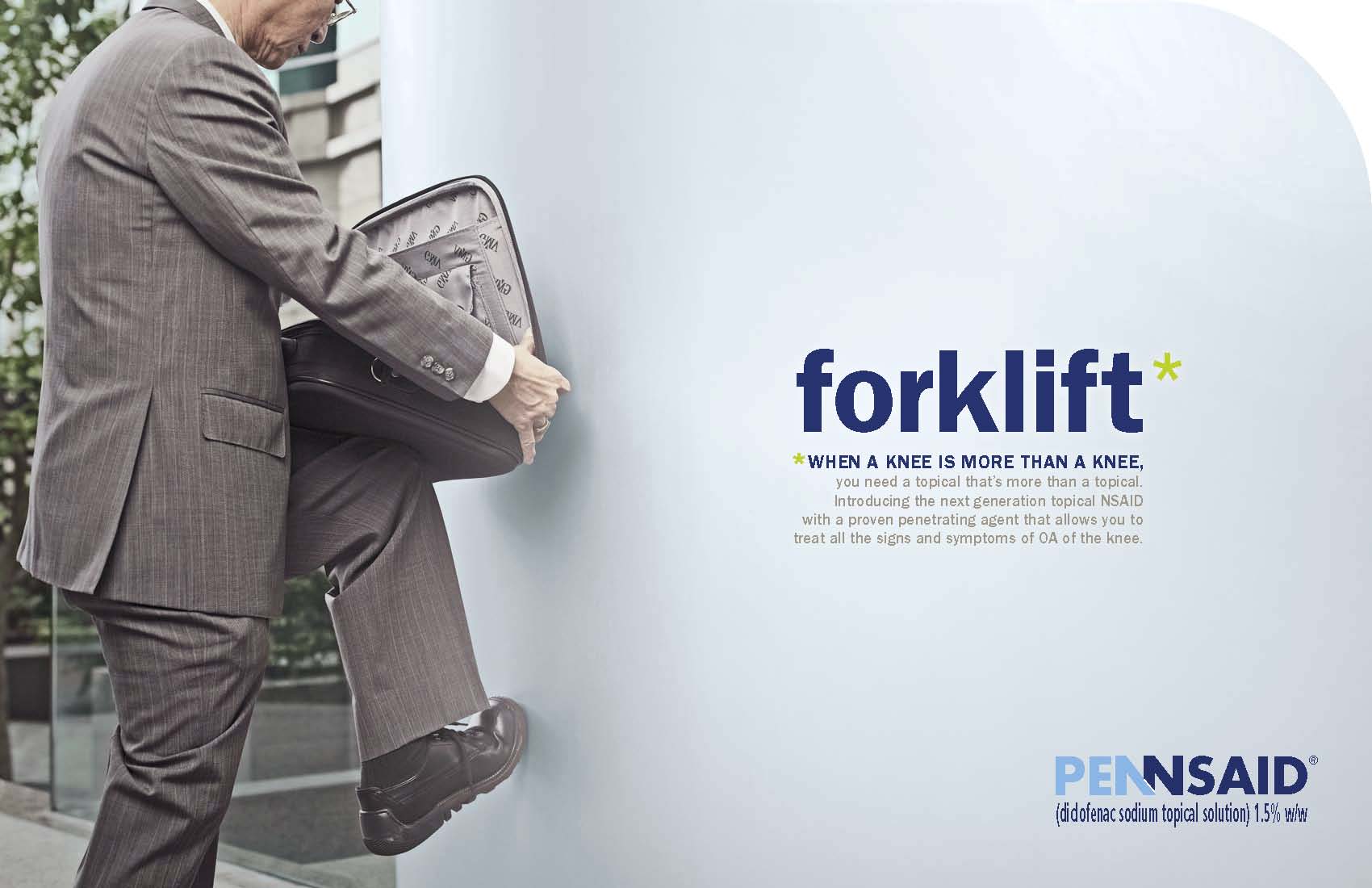 A man in a suit leaning against a wall with his back to the camera. He is holding a briefcase in his left hand and appears to be in pain or discomfort. The background shows a building and a tree. On the right side of the image there is a blue banner with the text "forklift" and the logo of Pennsaid. The text on the banner reads "When a knee is more than a knee."