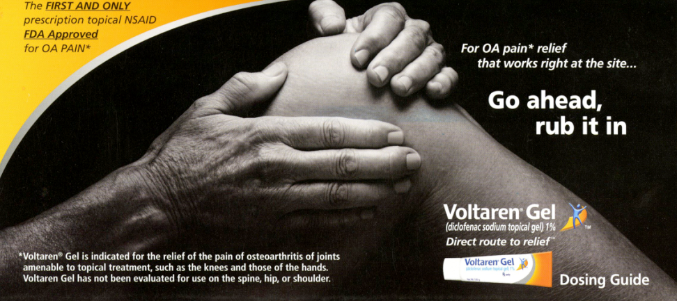 An advertisement for Voltaren Gel a product that helps to relieve pain and inflammation in the joints. The advertisement features a black and white photograph of two hands holding each other with the text "For OA pain relief that works right at the site... Go ahead rub it in" above them. The text below the photograph reads "Voltaren Gel is indicated for the relief of the pain of osteoarthritis of joints which can be used as a topical treatment such as the knees and those of the hands. Voltage Gel has not been evaluated for use on the spine hip or shoulder." <br /><br />On the right side of the image there is a logo for the Dosing Guide. The background of the advertisement is black and the text is in white.