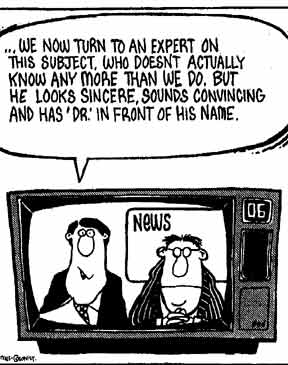 A black and white cartoon illustration of two men sitting in front of a television screen. The man on the left is wearing a suit and tie and has a speech bubble above his head that reads "We now turn to an expert on this subject. Who doesn't actually know any more than we do but he looks sincere sounds convincing and has 'DR' in front his name." The other man is wearing glasses and a suit. They are both looking at the television screen with a concerned expression on their faces. The television screen has the word "NEWS" written on it in bold letters.