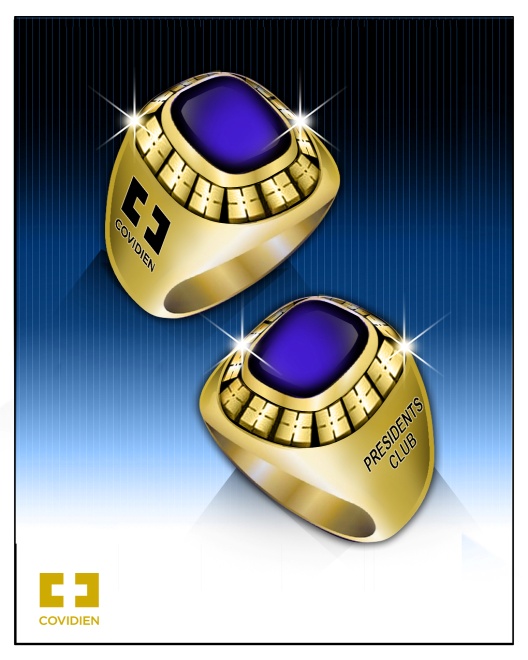 Two gold rings with a purple stone in the center. The rings are placed on a blue background with a diagonal striped pattern. The ring on the left has the word "Covidien" written on it in white letters while the one on the right has the words "Presidents Club" written in black letters. Both rings have a shiny finish and appear to be made of gold. The purple stone is surrounded by small diamonds giving the rings a luxurious and elegant look. The overall design of the rings is modern and luxurious.