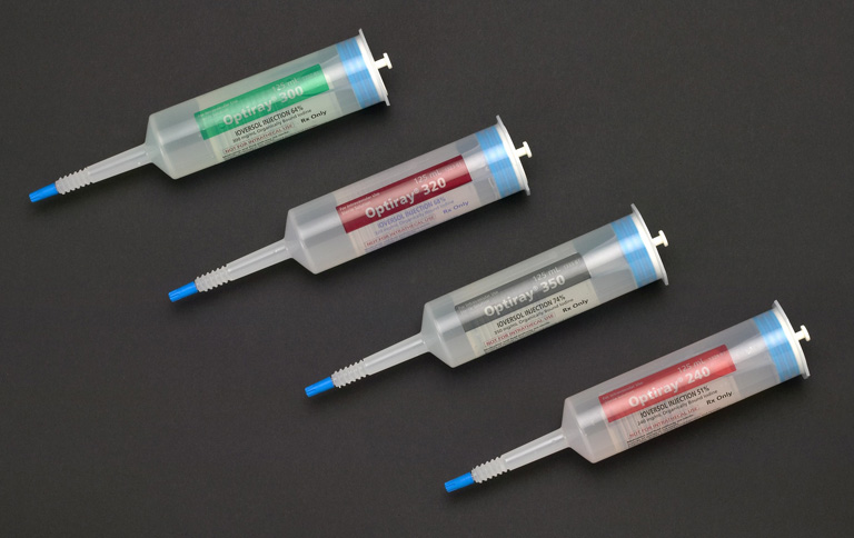 Four syringes of different sizes and shapes arranged in a row on a black background. The syringes are made of plastic and have a blue cap on top. Each syringe has a label on it with the brand name "Ophthalmoscope" written in white letters. The label also has a red and white label with the same brand name. The needles of the syringes vary in size and shape with the largest needle at the bottom and the smallest at the top.