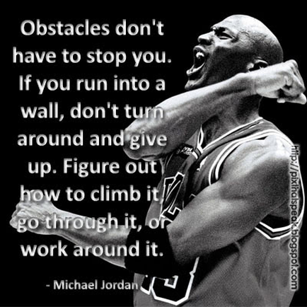 A black and white photograph of Michael Jordan a former professional basketball player. He is shown in a close-up shot with his arms stretched out to the sides and his mouth open in a yell. His body is muscular and toned and he is wearing a basketball jersey with the number 11 on it. The background is plain white. Overlaid on the image is text that reads "Obstacles don't have to stop you. If you run into a wall don't turn around and give up. Figure out how to climb it go through it or work around it."