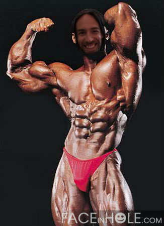 A photograph of a male bodybuilder flexing his biceps in a red posing suit. The face of an unidentified man has been superimposed over the original face however via the website FaceInHole.com.