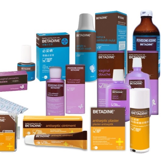 A collection of various products from the brand Betadine. There are nine products in total displayed beside their outer boxes. The products all have brown labels with other colors elsewhere (blue purple yellow).<br /><br />Products visible include Vaginal Pessaries Gargle & Mouthwash Povidone-Iodine Antiseptic Feminine Wash Vaginal Douche Antiseptic Ointment and Antiseptic Plaster. All of the products appear to be new and unused with no visible damage.