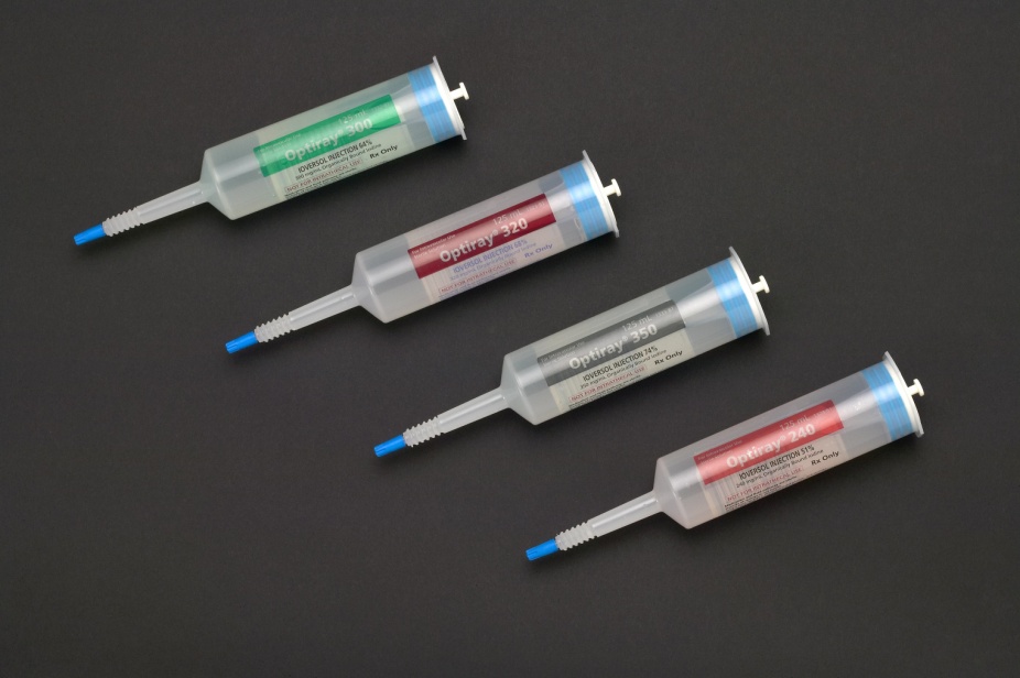 Four syringes of different sizes and shapes arranged in a row on a black background. The syringes are made of plastic and have a blue handle and a clear plastic body. Each syringe has a label on it with the brand name "Ophthalmoscope" written in white letters. The label also has a red and blue stripe running along the length of the syringe. The needles are pointed and appear to be made of metal. The background is plain black making the syringes stand out.