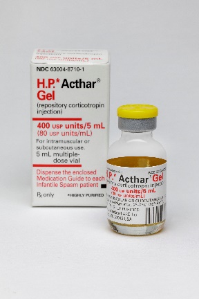 The packaging for H.P. Acthar Gel (repository corticotropin injection) with the outer box (with the front label visible) and the bottle (with the front of its label visible). The box is white with red and black text. The bottle is clear with a yellow lid and a white label (with black and red text). The background is white with the products appearing to be floating in a void.