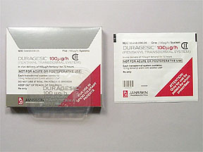 A white box with a red and white label on the front. The label has the brand name "DURAGESIC 100mg/ml" written in bold black letters. The box is rectangular in shape and has a clear plastic window on the top. On the right side of the box there is a small white card with the same brand name and product details. The card has a barcode and the brand's logo on the bottom right corner. The background is plain white.