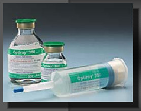 Three vials of medicine. The vials are made of glass and have green caps. The label on the vials is white with black text. The bottle on the left has a label that reads "Oxycodone" and the bottle in the middle has the same label as the one on the right. The syringe is white and has a blue cap. The background is a plain grey color.