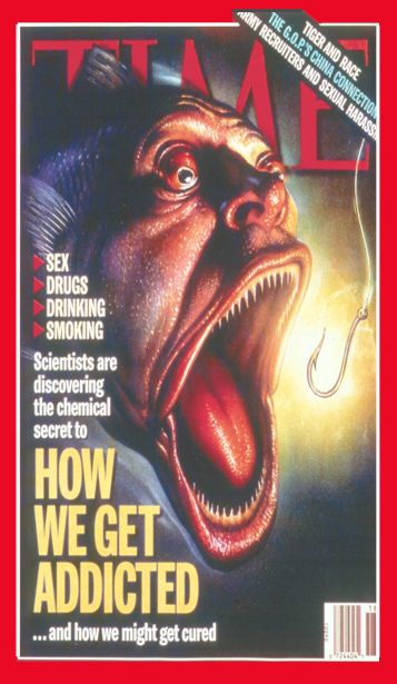 The cover of a Time magazine. The cover features a close-up of a large fish with its mouth open wide as if it is roaring. The fish appears to be a grouper with sharp teeth and a menacing expression. The background is dark and the magazine title is written in bold white letters at the top of the cover. Below the title there is text that reads "Sex Drugs Drinking Smoking Scientists are discovering the chemical secret to how we get addicted...and how we might get cured." The magazine's logo is also visible in the bottom right corner.