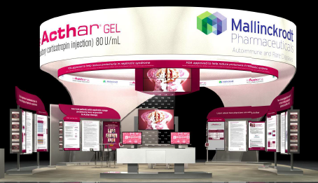 A 3D rendering of a trade show booth for Mallinckrodt Pharmaceuticals. The booth is white with a pink and green logo on the top right corner. The logo reads "Acthar Gel" and "80 U/mL". Below the logo there is a large banner with the company's name and contact information.<br /><br />The booth is divided into two sections with the left section on the left side and the right section in the middle. The left section has a large screen displaying information about the product while the middle section has smaller screens displaying more information about its products. There are also several smaller screens on the right side of the booth which appear to be displaying a list of products and their prices. The booths are arranged in a semi-circular layout with a white table in the center. The background is black making the booth stand out.