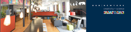 A collage of two photographs of a modern office space. On the left side of the image there is a long hallway with a red wall and a wooden floor. The hallway is decorated with colorful paintings and pendant lights hanging from the ceiling. The walls are painted in a bright red color and there are several windows on the right side allowing natural light to enter the space. In the center of the hallway there are two black sofas and a gray coffee table with a zebra print rug in front of them. There is a bookshelf with books and a red lamp on top of it. The floor is made of light-colored wood and the walls are covered in a patterned wallpaper. The overall aesthetic of the space is bright and airy with a mix of modern and eclectic elements.