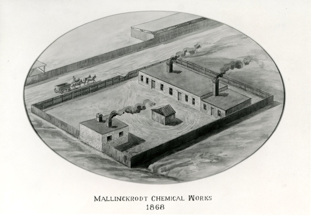 A black and white illustration of a large industrial area. It appears to be a factory or a factory building with multiple levels and chimneys. The building is surrounded by a fence and there are several workers on horse-drawn carts in the background. The sky is cloudy and the ground is wet suggesting that it has recently rained. The text on the image reads "Mallinckrodt Chemical Works 1868."