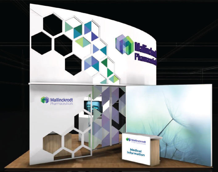 A trade show booth with a modern design. The booth has a white background with a geometric pattern of hexagons in different colors. On the left side of the booth there is a large banner with the logo of Mallinckrodt Pharmaceuticals a pharmaceutical company. The banner also has the company's name in purple and green letters. <br /><br />In front of the banner there are two smaller banners with the same logo. The first banner has a blue and white abstract design while the second banner has an image of a dandelion. The banners also have the words "Medical Information" written in white letters.<br /><br />The booth is set up on a wooden platform with a black background.