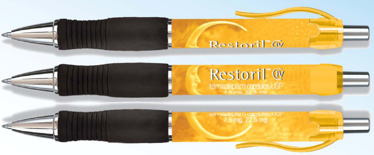 Three pens of different sizes and colors. The pens are arranged in a row with the first pen on the left the second pen in the middle and the third pen at the bottom. All three pens have a black rubber grip and a silver metal tip. The first pen has a yellow label with the brand name "Restoril" written in black text. The second pen has the brand's logo and the product name "temazepam capsules USP" written on it. The third pen has an image of a lemon on it and the text "7.5mg 22.5 mg". The pens appear to be new and unused.