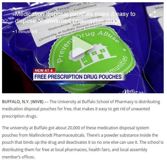 A screenshot of a news article with a video at the top. The title of the video is "Medication disposal pouches make it easy to dispose of unwanted prescription drugs." The video shows a blue pouch with a green circular emblem in the middle reading "Prevent Drug Abuse" with an illustration of a house tree and tree swing. <br /><br />The text below the video indicates that the University of Buffalo School of Pharmacy is distributing 20000 medication disposal pouches for free. The pouches are from Mallinckrodt Pharmaceuticals. The text describes how the pouch works and lists where they are being distributed. 