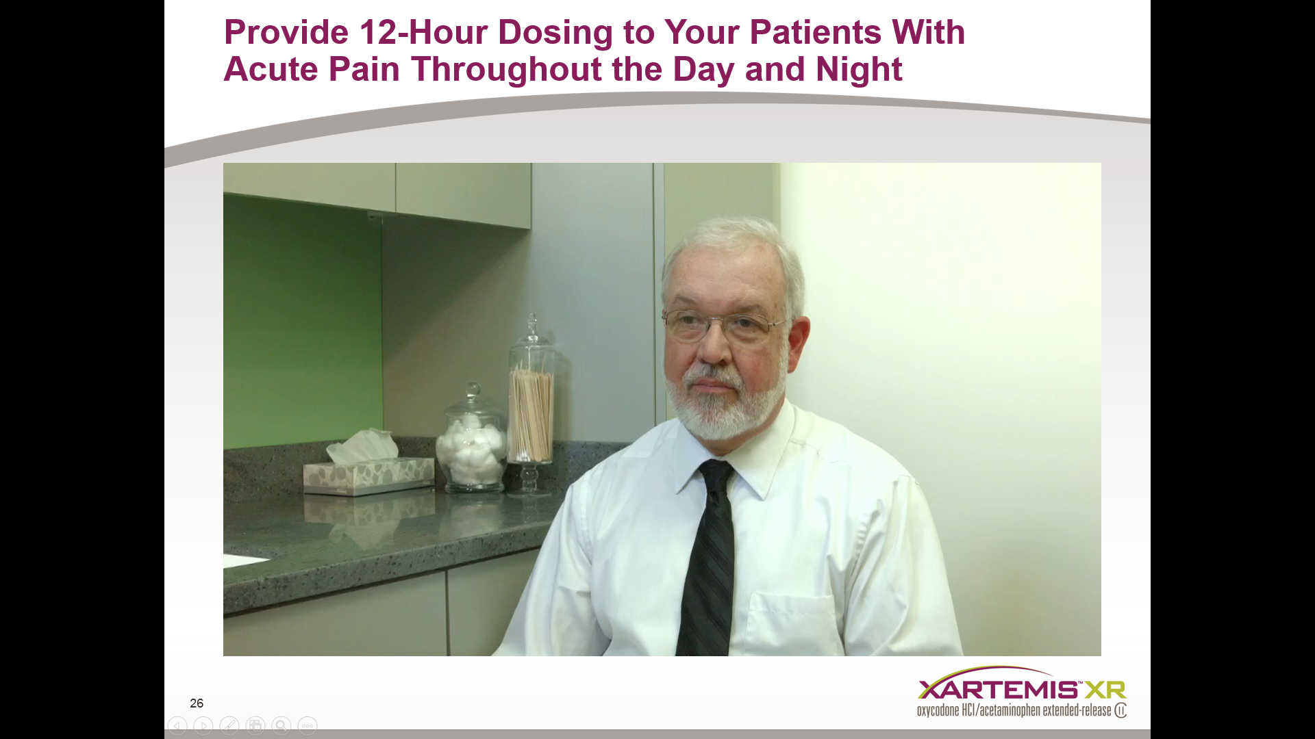 A middle-aged man with a white beard and glasses wearing a white shirt and a black tie. He is standing in front of a countertop with various items on it including a jar of toothbrushes a tissue box and a bottle of toothpaste. The background is a plain white wall. The image is accompanied by text that reads "Provide 12-Hour Dosing to Your Patients With Acute Pain Throughout the Day and Night".