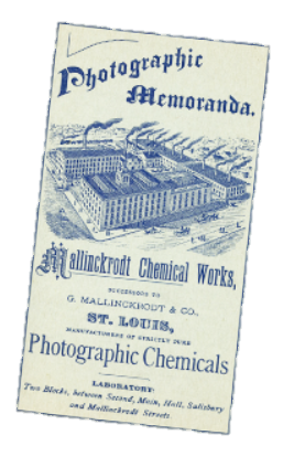 Titled "Photographic Memoranda." It is blue and white and features an illustration of a large industrial building with multiple levels and chimneys. Below the illustration there is a subtitle that reads "Mallinckrodt Chemical Works G. Mallinckrodt & Co. St. Louis Photographic Chemicals" in a smaller font. The image appears to be from the 1920s or earlier.