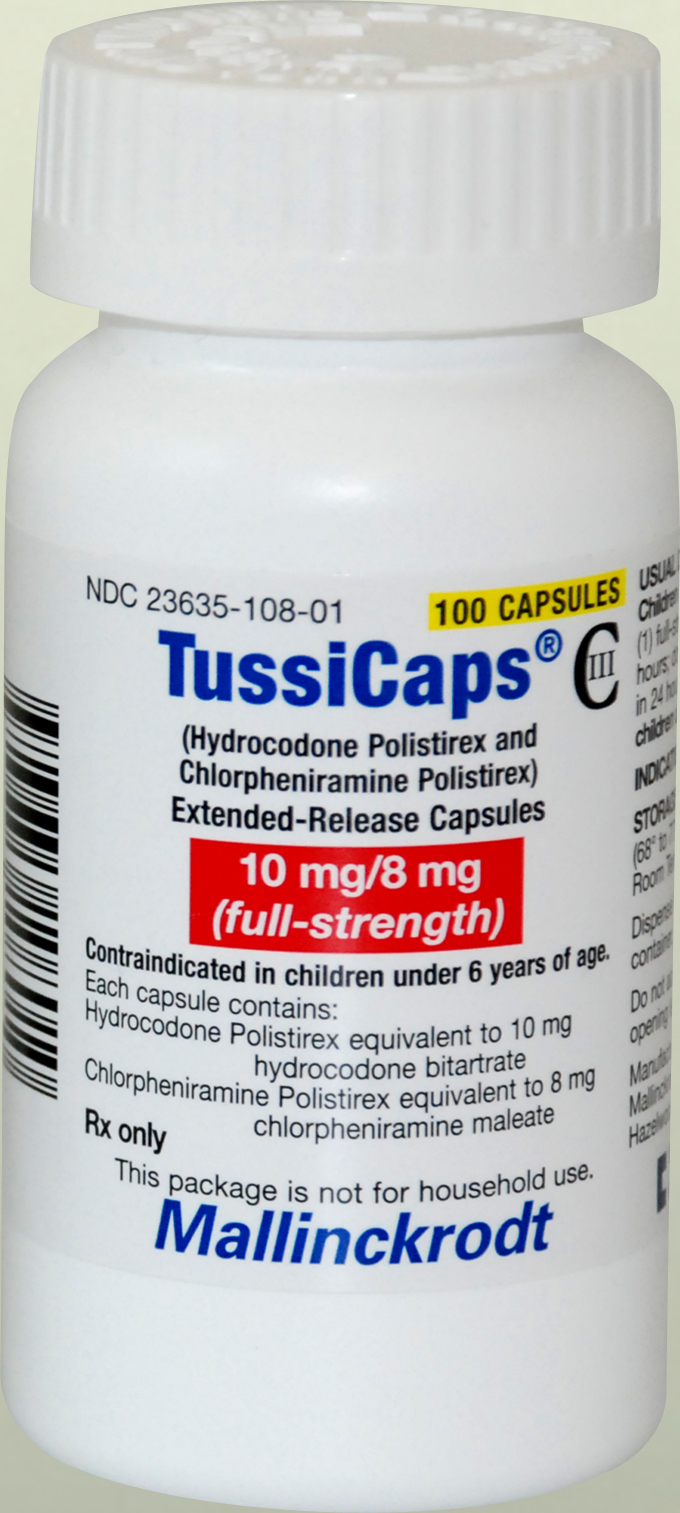 A photograph of a white plastic bottle with a white cap. The bottle is labeled "Tuscans" and has a label that reads "10 mg/8 mg (full-strength)". The label also mentions that the bottle contains 100 capsules of the product. There is a barcode on the left side of the label and the brand name "Mallinckrodt" is written in blue at the bottom. The background is plain white.