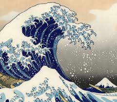 A traditional Japanese woodblock print of the iconic "The Great Wave off Kanagawa" by the artist Hokusai. It depicts a large wave crashing against a mountain peak with a cloudy sky in the background. The wave is blue and white with swirls and curves that create a sense of movement and energy. The mountain peak is covered in snow and there are a few boats visible in the foreground. The overall mood of the image is dramatic and powerful.