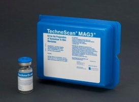 A blue plastic box with a label that reads "Technescan MAG3". The box is rectangular in shape and has a handle on the top for easy carrying. The label also has some information about the product such as its size capacity and other specifications. Next to the box there is a small vial with a blue cap. The vial appears to be filled with a clear liquid. The background is black.