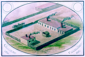 An oval-shaped illustration of a farm. The farm is located in a rural area with a dirt road running through it. There are several buildings on the farm including a large building with a red roof and a chimney on the right side. On the left side there is a small building with two chimneys and a small shed on the ground. In the center of the image there are two smaller buildings with chimneys. The buildings are surrounded by a fence and there are trees in the background. The sky is blue and the overall color scheme of the illustration is green and blue. The image appears to be hand-colored and has a vintage feel to it.