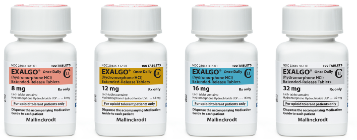 Four white medicine bottles with red caps. Each bottle has a label that reads "EXALGO" in bold black letters. The label also mentions that the bottles contain 8mg 12mg 16mg and 32mg of the medication. The bottles are arranged in a row with the first bottle on the left the second bottle in the middle and the third bottle at the bottom. The background is plain white.