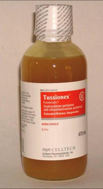 Of a 473 mL bottle of Tussionex extended-release suspension a cough syrup containing hydrocodone polistirex and chlorpheniramine polistirex. The liquid is orange the lid is white the bottle is clear and the label is in orange and black (on a white background). There is a logo for Celltech Pharmaceuticals Inc. near the bottom.