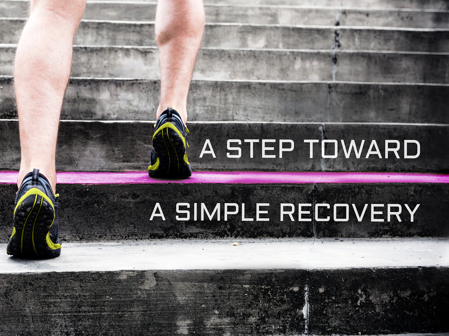 A person's legs and feet walking up a set of stairs. The stairs are made of concrete and have a pink line running down the middle. The person is wearing black and yellow running shoes with black soles. The image is accompanied by text that reads "A STEP TOWARD A SIMPLE RECOVERY". The text is written in a bold sans-serif font and is centered on the stairs.