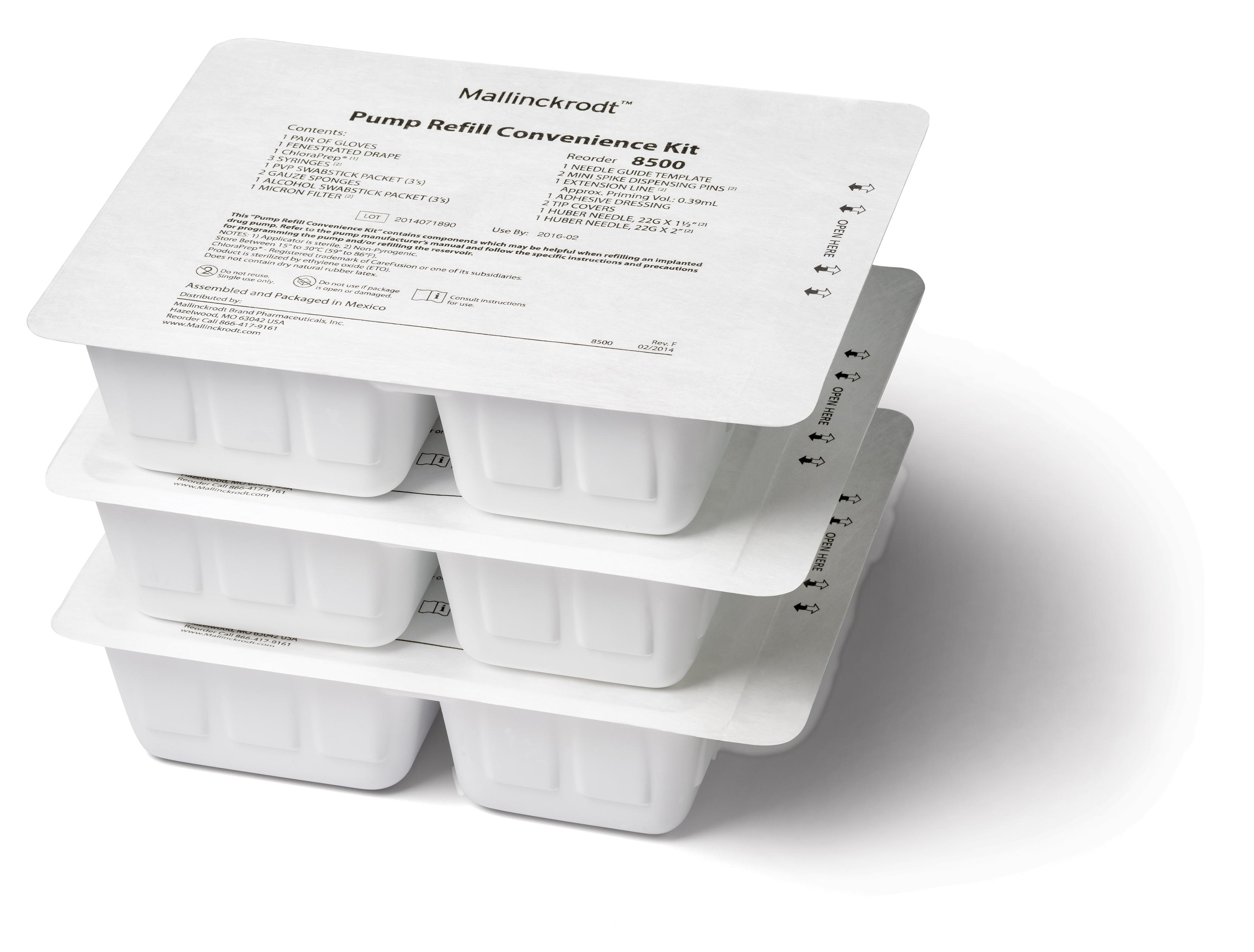 A stack of six white plastic containers with a label on top. The label reads "Mallinckrodt Pump Refill Convenience Kit". The containers are arranged in a pyramid-like shape with the topmost container being the largest and the bottom two being the smallest. Each container has six compartments each with a handle on top for easy carrying. The containers appear to be new and unused with no visible signs of wear or tear. The background is plain white.