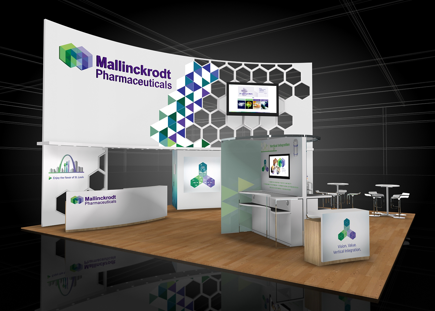 A 3D rendering of a trade show booth for Mallinckrodt Pharmaceuticals. The booth has a white background with a colorful geometric pattern in shades of blue green and purple. On the left side of the booth there is a large banner with the company's logo and name in bold black letters. <br /><br />In the center of the image there are two white reception desks with a large screen on the right side. The desks are arranged in a semi-circular layout with a wooden floor and white walls. There are also two small white tables and chairs in front of the desks.<br /><br />The booth also has a large window on the front allowing natural light to enter the space. The overall design is modern and professional with a focus on the company and its products.