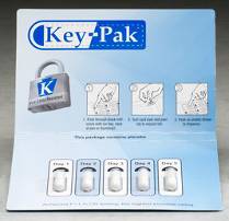 Of a product packaging of Key-Pak. The packaging is a light blue cardboard box with the brand name "Key-Pak" written in bold white letters at the top. On the left side of the box there is an image of a padlock with the letter "K" on it. Below the padlock there are six images of the product each showing a different type of lock. <br /><br />The first image on the top left shows a lock with a keyhole the second image shows a key the third image shows two keys and the fourth image shows three keys. The fifth image shows four keys the sixth image shows five keys two of which are white and one of which is black. The seventh image shows six keys each with a different design. The eighth image shows the same design as the first one but with different colors and patterns.<br /><br />At the bottom of the packaging there has a list of the keys and their corresponding numbers. The keys are arranged in a grid-like pattern with each key having a different color and design.