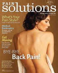 The cover of a magazine titled "Pain Solutions". The cover features a photograph of a woman with her back to the camera facing away from the camera. She is wearing a white tank top and her hair is styled in loose curls. The background is a plain beige color. The title of the magazine is written in bold black letters at the top of the cover. Below the title there is a subtitle that reads "What's Your Pain Style? Medical Bankruptcy Get Moving Bye-bye Back Pain!" The magazine's logo is also visible in the bottom right corner.