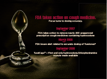 A black background with a silver spoon on the left side. The spoon is placed on a black surface and appears to be made of metal. On the right side of the image there is text that reads "FDA takes action on cough medicine. Focus turns to dosing accuracy. September 2007. FDA takes action to remove nearly 200 unapproved prescription on cough medicines containing hydrochloride. March 2008. FDA issues alert related to accurate dosing of Tussionex. September 2008. TussiCaps - First and only hydrocodone/chlorphenamine capsule made available." The text is in white and is centered on the image.