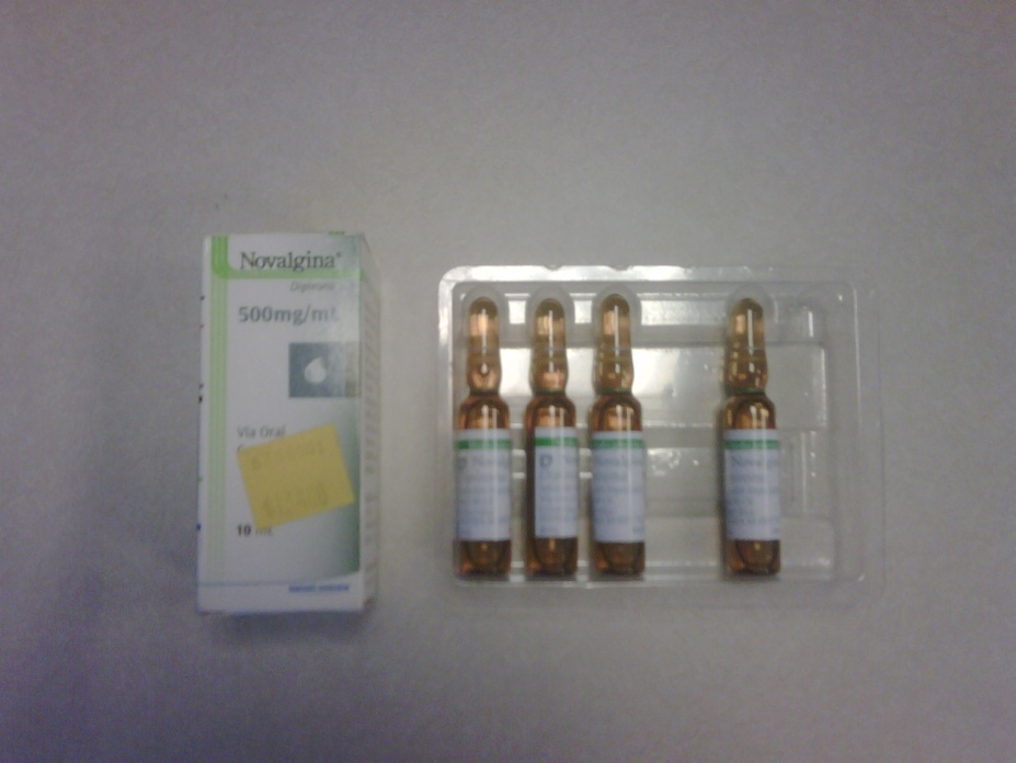 A pack of Novalgina 500mg/ml vials. The pack is rectangular in shape and has a clear plastic cover. Inside the pack there are four small amber-colored vials with white labels. The vials are arranged in a row and appear to be empty. On the left side of the image there is a white box with the brand name "Novalgina" written in green and yellow letters. The box also has a yellow sticky note attached to it. The background is plain white.