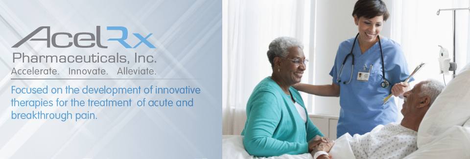 A nurse and an elderly woman in a hospital room. The nurse is wearing a blue scrub suit and a stethoscope around her neck and she is holding a clipboard. The elderly woman is sitting on a hospital bed and is smiling at the nurse. The background shows a window with white curtains and a medical equipment. The image is accompanied by text that reads "AcelRx Pharmaceuticals Inc. Accelerate Innovate Alleviate. Focused on the development of innovative therapies for the treatment of acute and breakthrough pain."