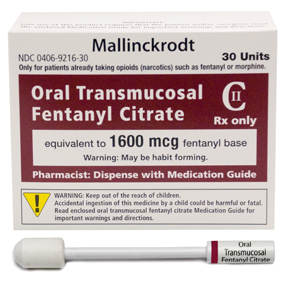 A product packaging of Mallinckrodt Oral Transmucosal Fentanyl Citrate. The packaging is white with red and black text. The text on the packaging reads "Only for patients already taking opioids (narcotics) such as fentanyl or morphine. Rx only. Equivalent to 1600 mcg fentanyl base. Pharmacist: Dispense with Medication Guide." There is also a warning label on the bottom right corner of the packaging that reads "Warning: Keep out of reach of children. Accidental ingestion of this medication by a child could be harmful or fatal. Read enclosed warnings and directions."