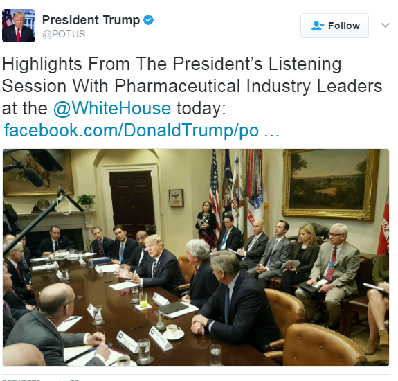 A screenshot of a tweet from President Trump's Twitter account. The tweet reads "Highlights From The President's Listening Session With Pharmaceutical Industry Leaders at the WhiteHouse today: Facebook.com/DonaldTrump/po..." and is accompanied by a photo of a group of people sitting around a large conference table in the Oval Office of the White House. The people in the photo appear to be engaged in a discussion with some of them holding papers and others gesturing with their hands. The room is decorated with flags and paintings on the walls.