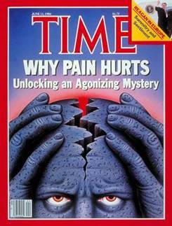 The cover of a Time magazine. The cover is predominantly blue and red with the title "Why Pain Hurts: Unlocking an Agonizing Mystery" written in bold white letters at the top. Below the title there is a large image of a person's face with their hands covering their eyes. The face appears to be made up of cracks and crevices giving it an eerie and unsettling appearance. The background is a gradient of red and blue creating a sense of depth and mystery. The magazine's logo is also visible at the bottom of the cover.