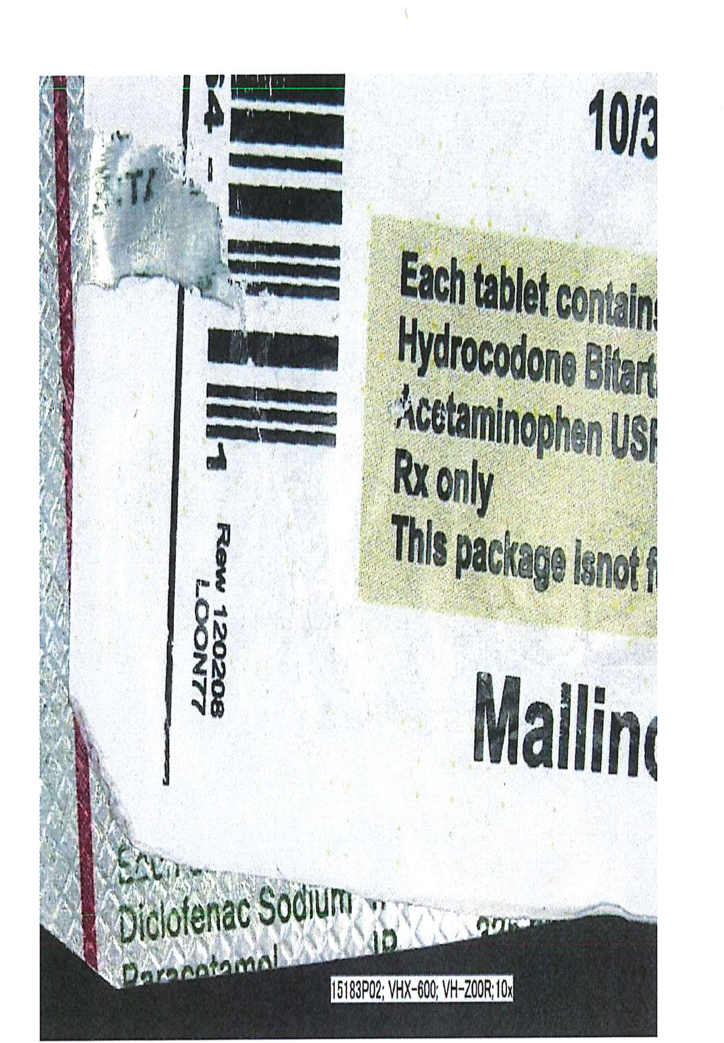 A close-up of a label on a medicine bottle. The label is rectangular in shape and has a white background with black text. On the left side of the label there is a barcode and a label that reads "10/3". On the right side there are two lines of text that read "Each tablet contains Hydrocodone Bitartrate Acetaminophen USP Rx only This package is not for sale". The label also has the word "Mailing" written in bold black letters at the bottom.