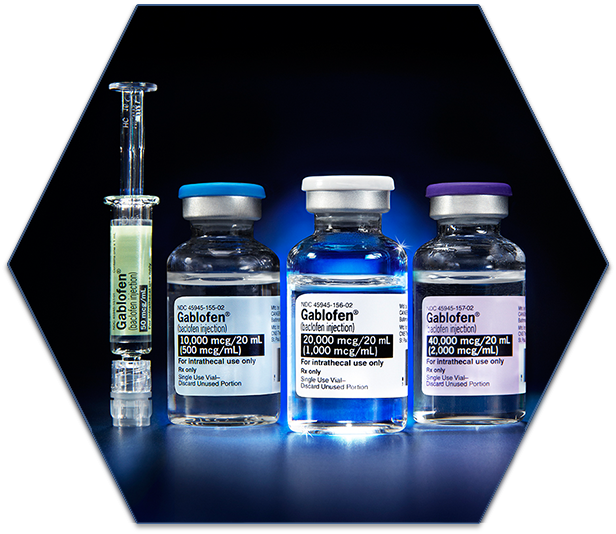 Three vials of different sizes and colors - one with a blue label one with white label and one with purple label. The vials are arranged in a triangular formation on a black background and have blue caps. On the left side of the image there is a syringe with a liquid inside. The label on the syringe reads "Gablofen" in white letters. The background is a solid black color.