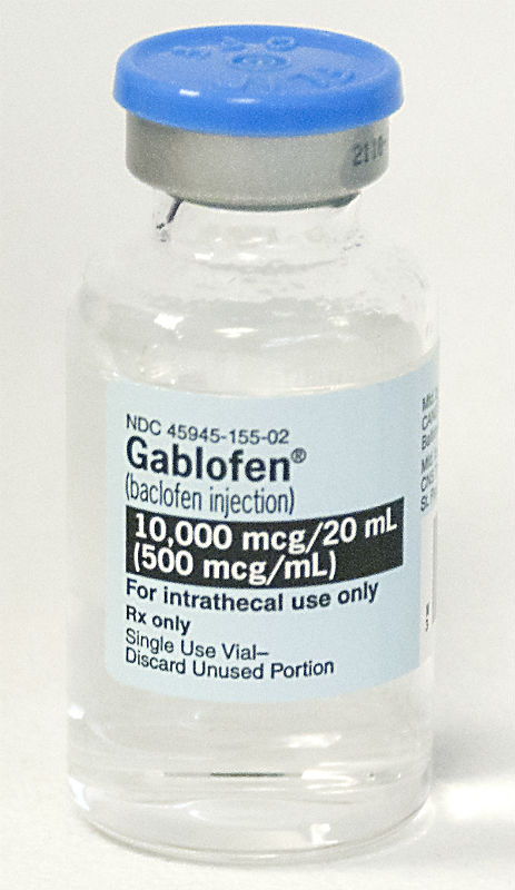 Of a small vial with a blue lid. The vial is made of clear glass and has a label on it that reads "NDC 45945-155-02 Gablofen (baclofen injection) 10000 mcg/20 ml (500 mcg /ml) For intraceutical use only". The label also mentions that it is a single use vial and to discard unused portion. The background is white.