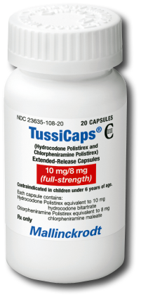 Of a white plastic bottle with a white cap. The label on the bottle is blue and white with the brand name "TussiCaps" written in bold letters at the top. Below that there is a description of the product which states that it is 10 mg/8 mg (full-strength) and contains 20 capsules. The bottle also mentions that the product contains children under 6 years of age. The brand name is "Mallinckrodt" and the product name is written in smaller letters below the description. The background of the label is black.