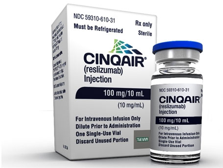 A white box with the text "CINQAIR (resilizumab) Injection" written on it. Next to the box there is a small vial with a blue lid. The vial is labeled "100 mg/10 ml" and has a label that reads "For Intravenous Infusion Only Dilute Prior to Administration One Single-Use Vial Discard Unused Portion". The box also has the text "NDC 59310-610-31" and the words "Must be Refrigerated" written in green. The background is plain white.