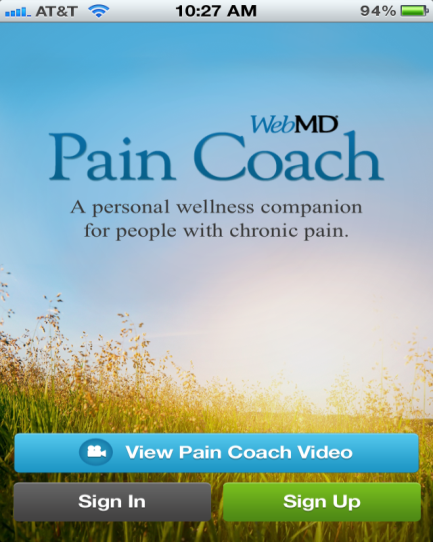 A screenshot of the homepage of a website called WebMD Pain Coach. The background of the page is a photo of a field of tall grass with a blue sky in the background. The text on the page reads "Pain Coach: A personal wellness companion for people with chronic pain." Below the text there is a button that says "View Pain Coach Video" and a "Sign In" button. At the top of the screen there are two buttons - "Sign in" and "Sign up".