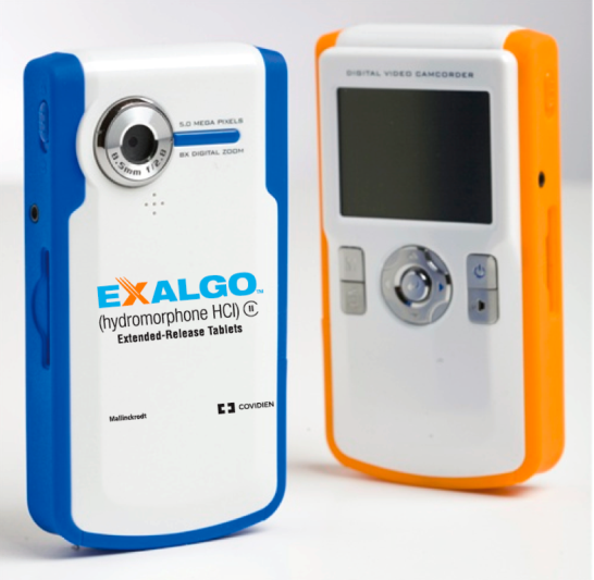 Two electronic devices one in blue and the other in orange. The blue device is an Exalgo (hydromorphone HCI) extended-release tablet which is a device used to measure the thickness of a person's body. The orange device is a digital video camcorder which can be used to record and record video footage. Both devices have a small LCD screen on the front and a button on the right side for adjusting the settings. The device also has a built-in microphone and a speaker on the left side.